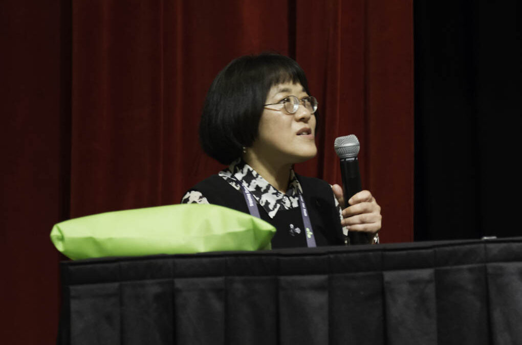 Dr. Young Ko participates in the discussion.
