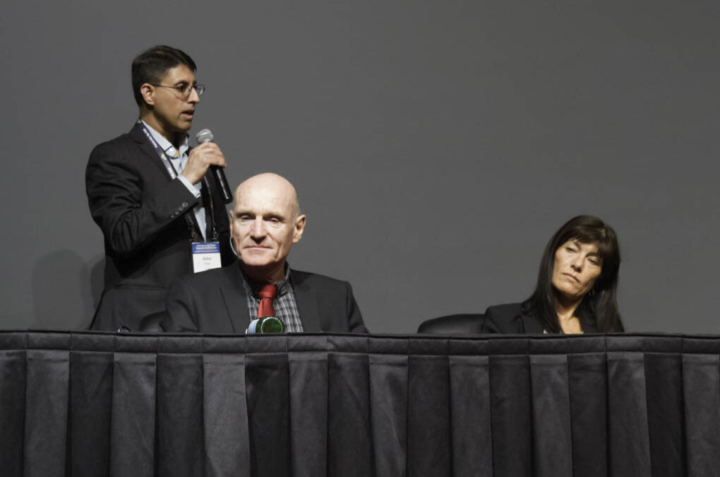 Dr. Khan asks questions of the panel about how to improve conventional chemotherapy standards of care.