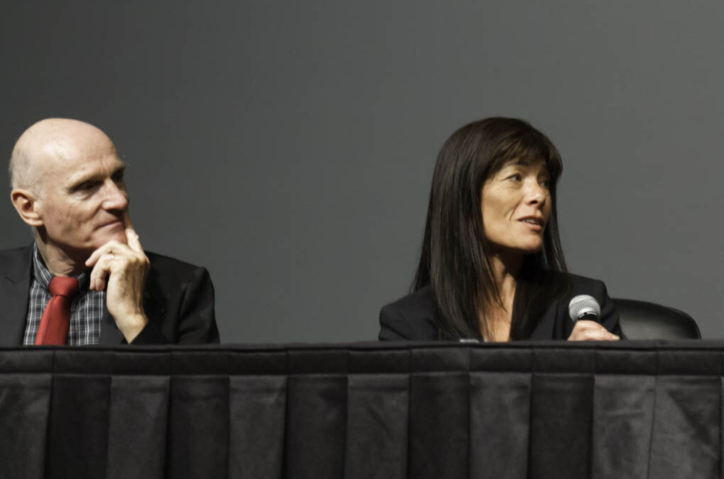 Dr. Bagot and Dr. Taguchi engage in the discussion.