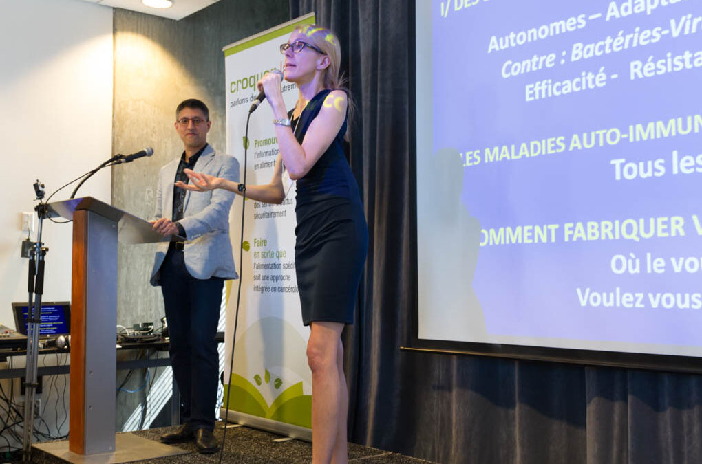 Dr. Cynthia Gariépy translating questions from the audience.