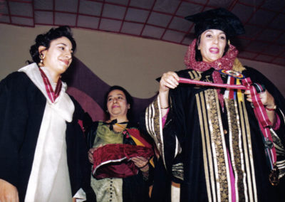 Medicor president Dr. Humaira Khan (left), receiving awards from Prime Minister of Pakistan Benazir Bhutto