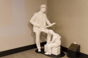Statue representing a passenger at the train station