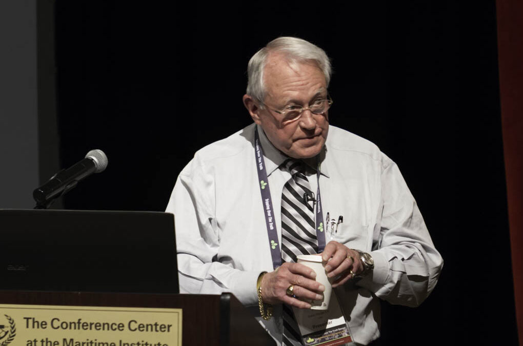 Dr. Robert Elliott taking questions from the audience.