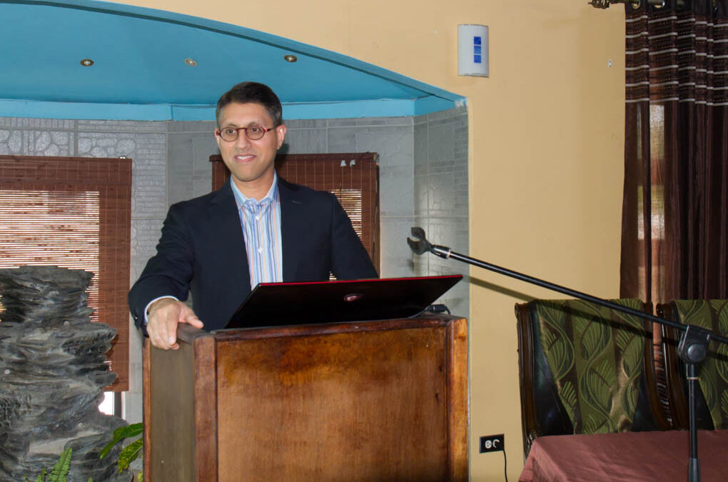 Dr. Khan presenting about innovative cancer prevention / treatment ideas
