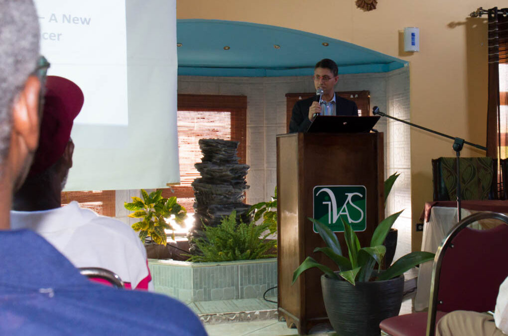 Dr. Khan presenting about innovative cancer prevention / treatment ideas