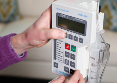 Dr. Andrews programs a computerized infusion pump