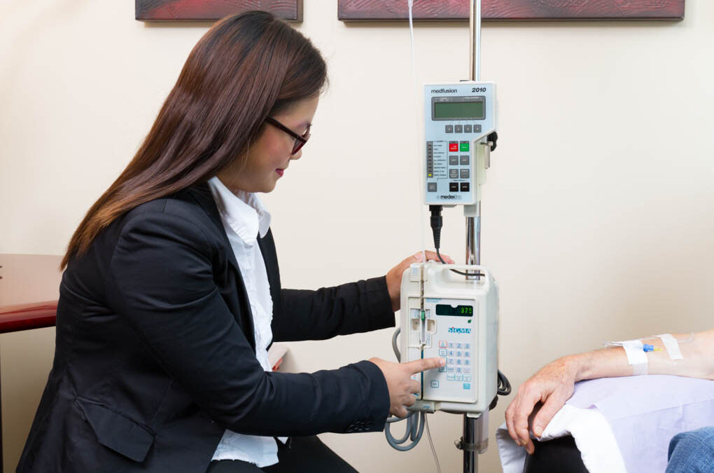 Nurse Carlan programming a computerized infusion pump