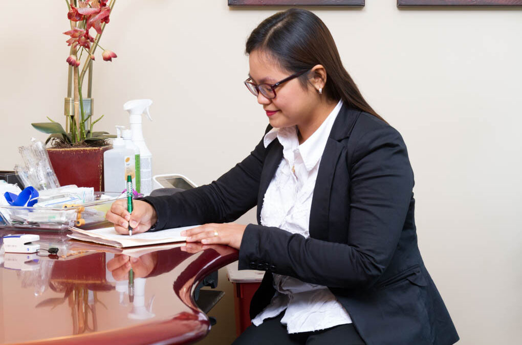 Nurse Carlan working on patient records for an intravenous therapy