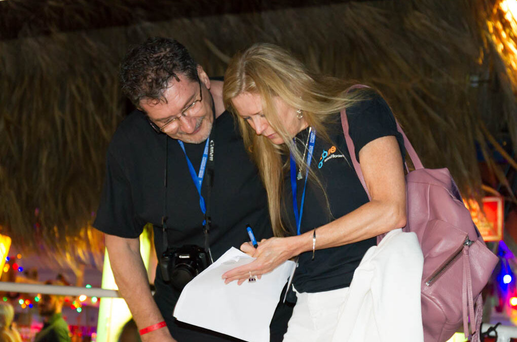 Dr. Peter Jovanovic organizing the night-time catamaran cruise
