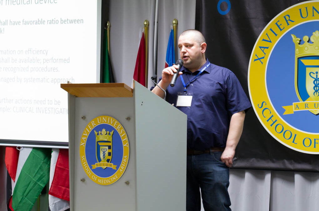 Uroš Tacar, engineer, discussing medical ozone generating equipment